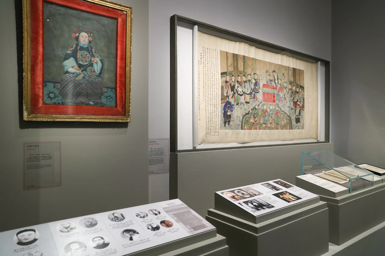 Mei Lanfang portrait and traditional Chinese scroll paintings displayed with museum track lighting at National Museum of China exhibition
