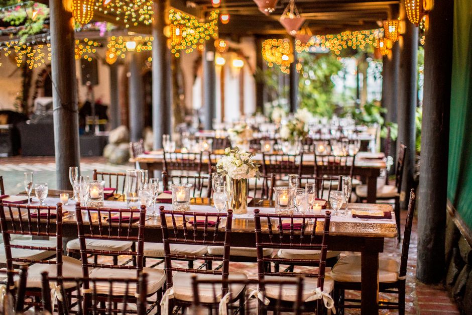 Elegant wedding table setting with floral centerpieces