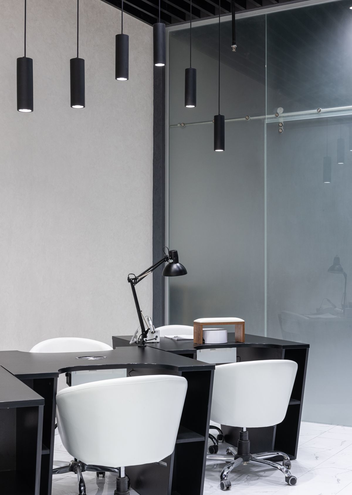 Sleek modern office interior with adjustable ceiling track lighting