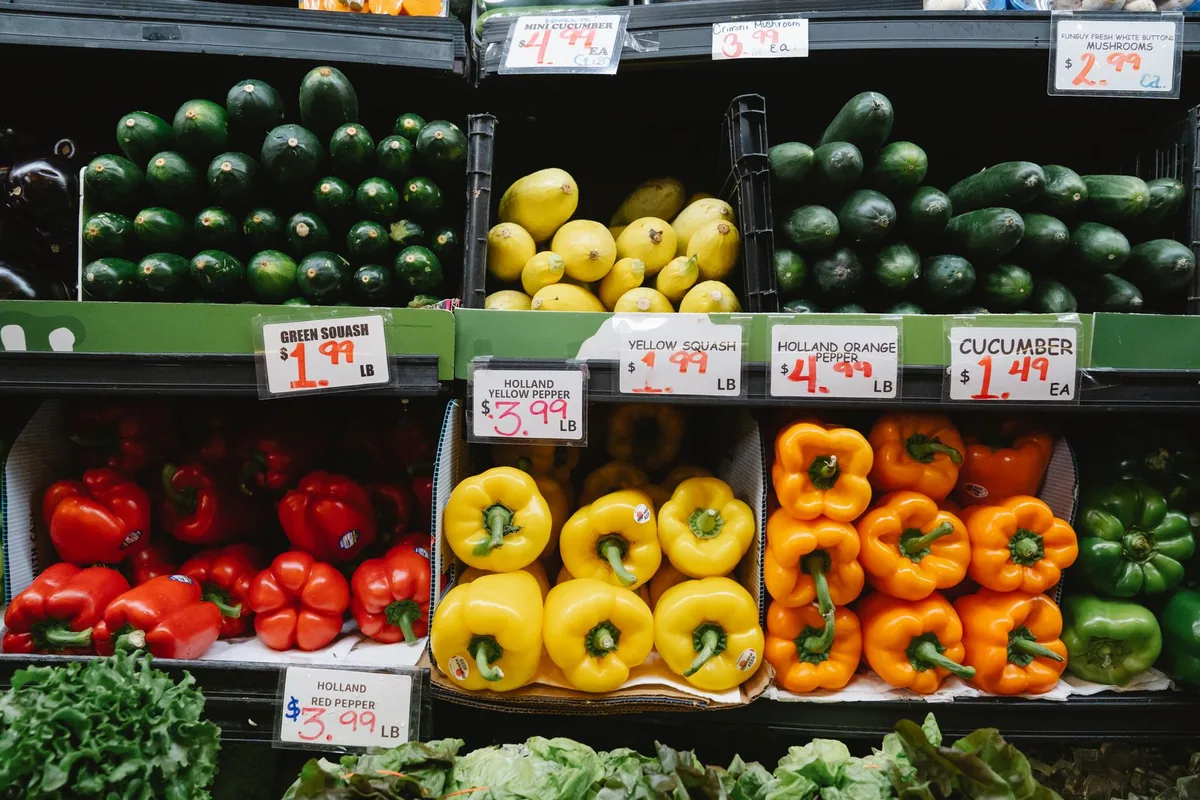 Fresh produce rack under bright retail display lighting showing how R9 colour rendering makes fruit and vegetables look ripe